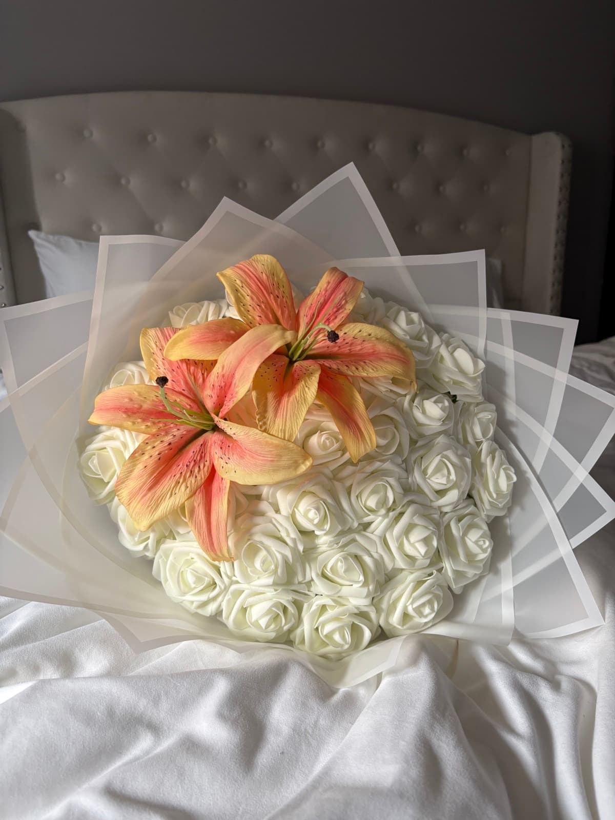 White roses with orange lilies bouquet