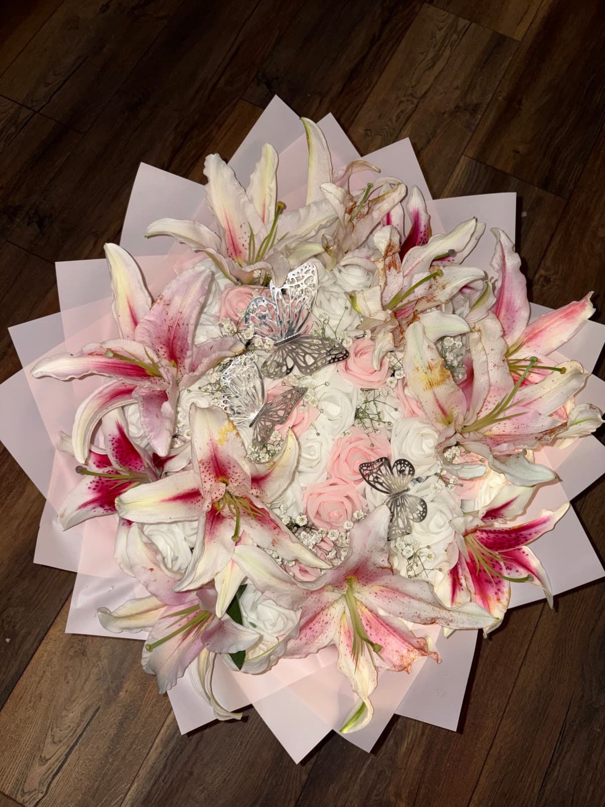 Soft pink and white eternal rose bouquet with lilies and butterflies